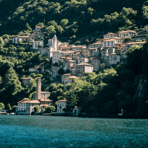 Italian lakeside village illustrating Italy as a destination for UHNWI and family offices