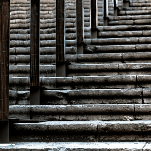 Stone steps forming a structured path, representing a disciplined and phased approach to building an AI strategy for a single-family office